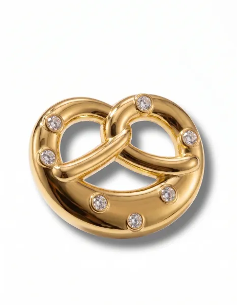 Eleganter Metall-Pin Brezn als Trachtenaccessoire für Oktoberfest