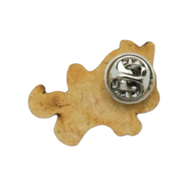 Einhorn-Pin an einem eleganten Dirndl befestigt. Hol dir den magischen Touch für das Oktoberfest bei Glubbal.shop!