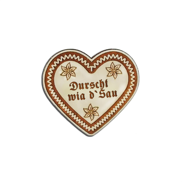 "Durscht wiad Sau-Anstecker in Lebkuchen-Optik - erhältlich bei Glubbal.shop"