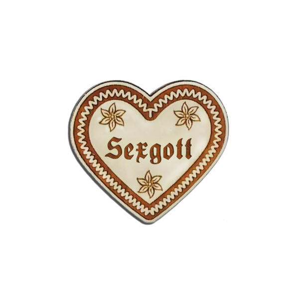 "Sexgott-Anstecker in Lebkuchen-Optik - erhältlich bei Glubbal.shop"