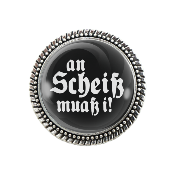 Pracht-Gaudibrosche mit Aufschrift „An Scheiß muaß i“ in silberner Fassung